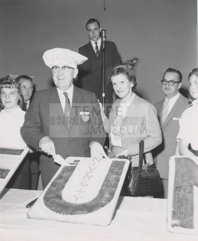 Dr. and Mrs. Gammage cutting ceremonial cake