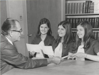Alfred Thomas Jr. Presents Honors Entrance Certificates to Triplets