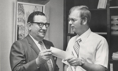 Carl Miller Receives Check from Richard Duve for Gifts and Endowments to A.S.U.