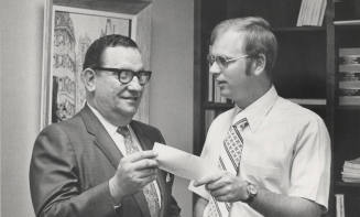 Carl Miller Receives Check from Richard Duve for Gifts and Endowments to A.S.U.