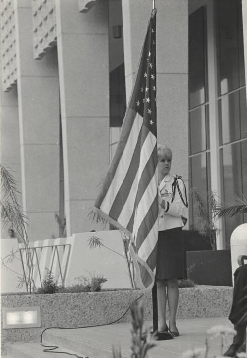 R.O.T.C. Woman Holding an American Flag
