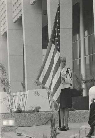 R.O.T.C. Woman Holding an American Flag