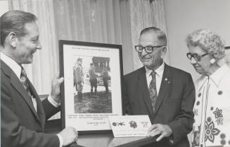 President John W. Schwada and Mr. & Mrs. John H. Barry