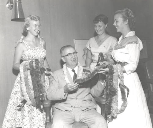 President Gammage Surrounded by Pretty Coeds for a Special Event