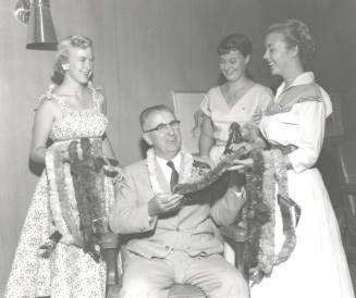 President Gammage Surrounded by Pretty Coeds for a Special Event