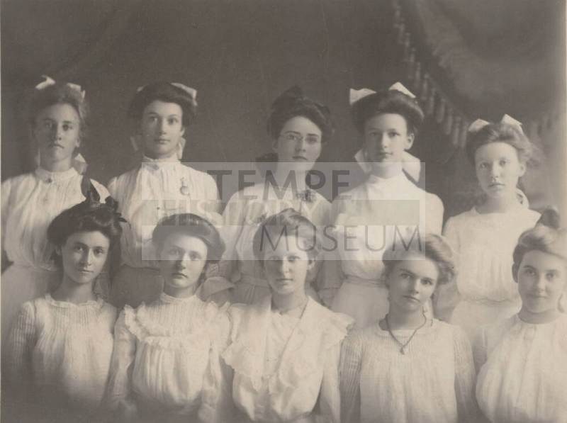 Probable Class Picture of 10 Women, Mounted on Decorative Board