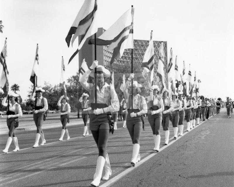A.S.U. Flag Team and Marching Band Parading Before Game