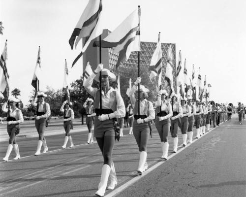 A.S.U. Flag Team and Marching Band Parading Before Game