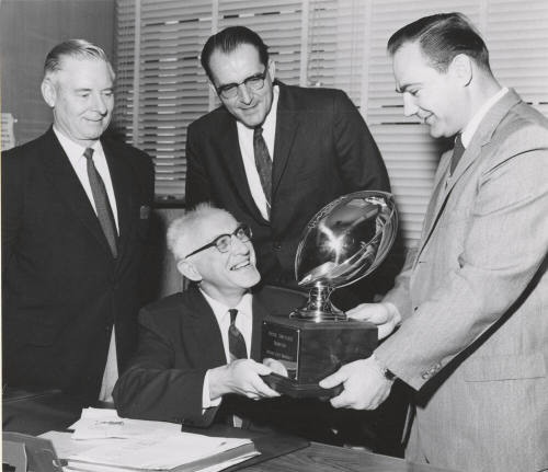 1959 Football Trophy being Presented to Frank Kush