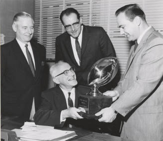 1959 Football Trophy being Presented to Frank Kush