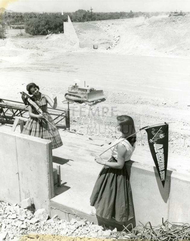 Mrs. Lucille Wanee and Student Watch Construction of Football Stadium