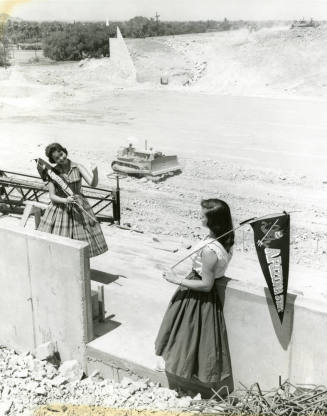 Mrs. Lucille Wanee and Student Watch Construction of Football Stadium