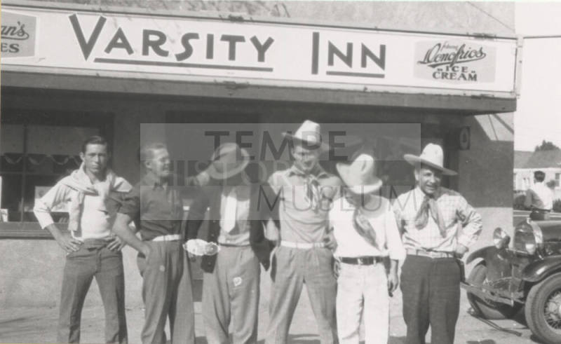 Group Photograph of Men Standing in Front of Varsity Inn