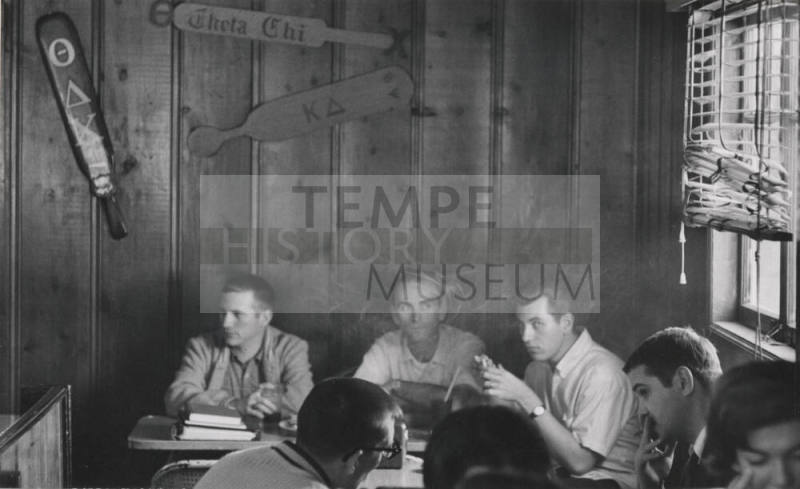 Group Photograph of Men Seated at Varsity Inn