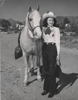 Rodeo Queen, Sue England, with her Horse