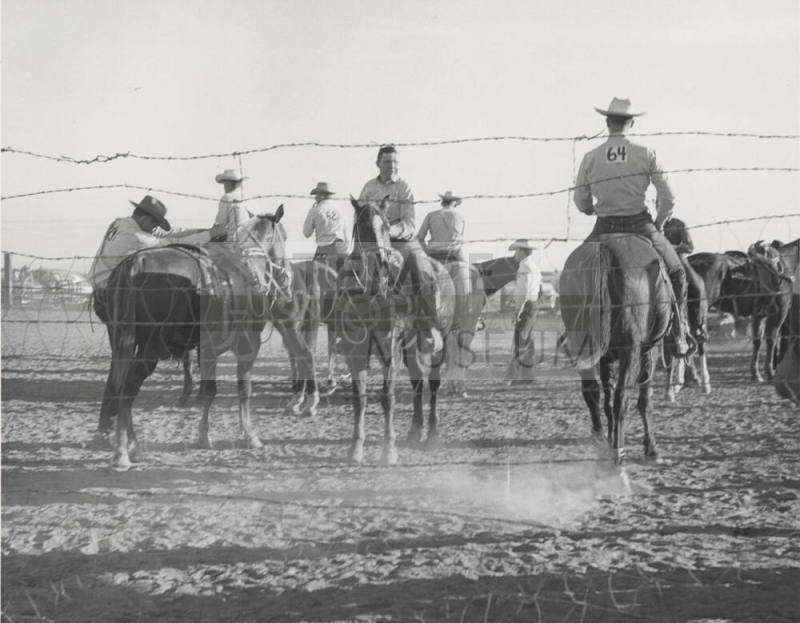 Cowboys on Horseback Waiting for Rodeo Events